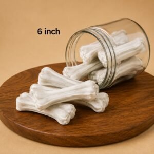 Six-inch bone-shaped dog chews spilling from a glass jar onto a wooden board, with '6 inch' text in the background.